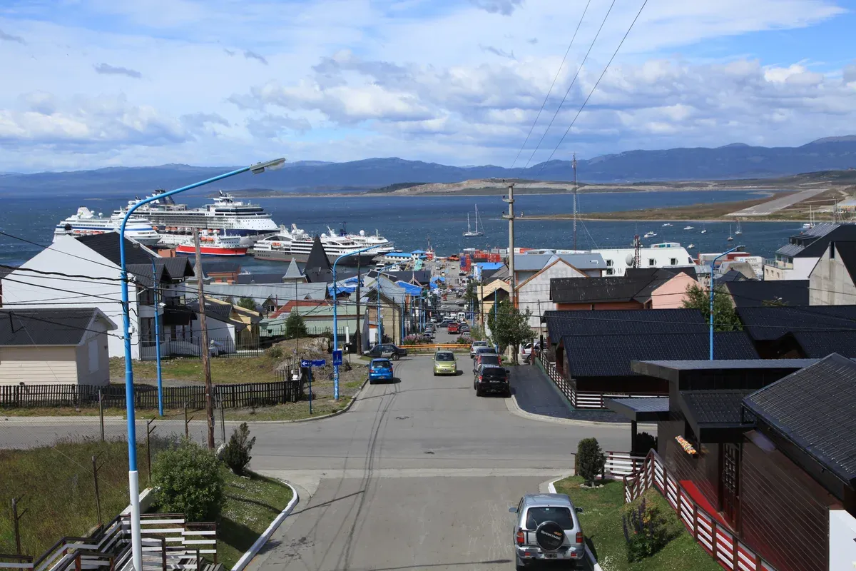 Residential street of timber houses sloping toward the Beagle Channel in Ushuaia, Argentina